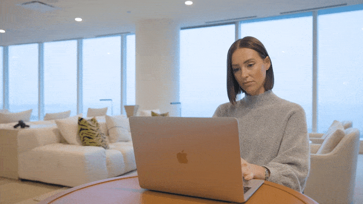 woman using realync virtual leasing software to customize her apartment tour video