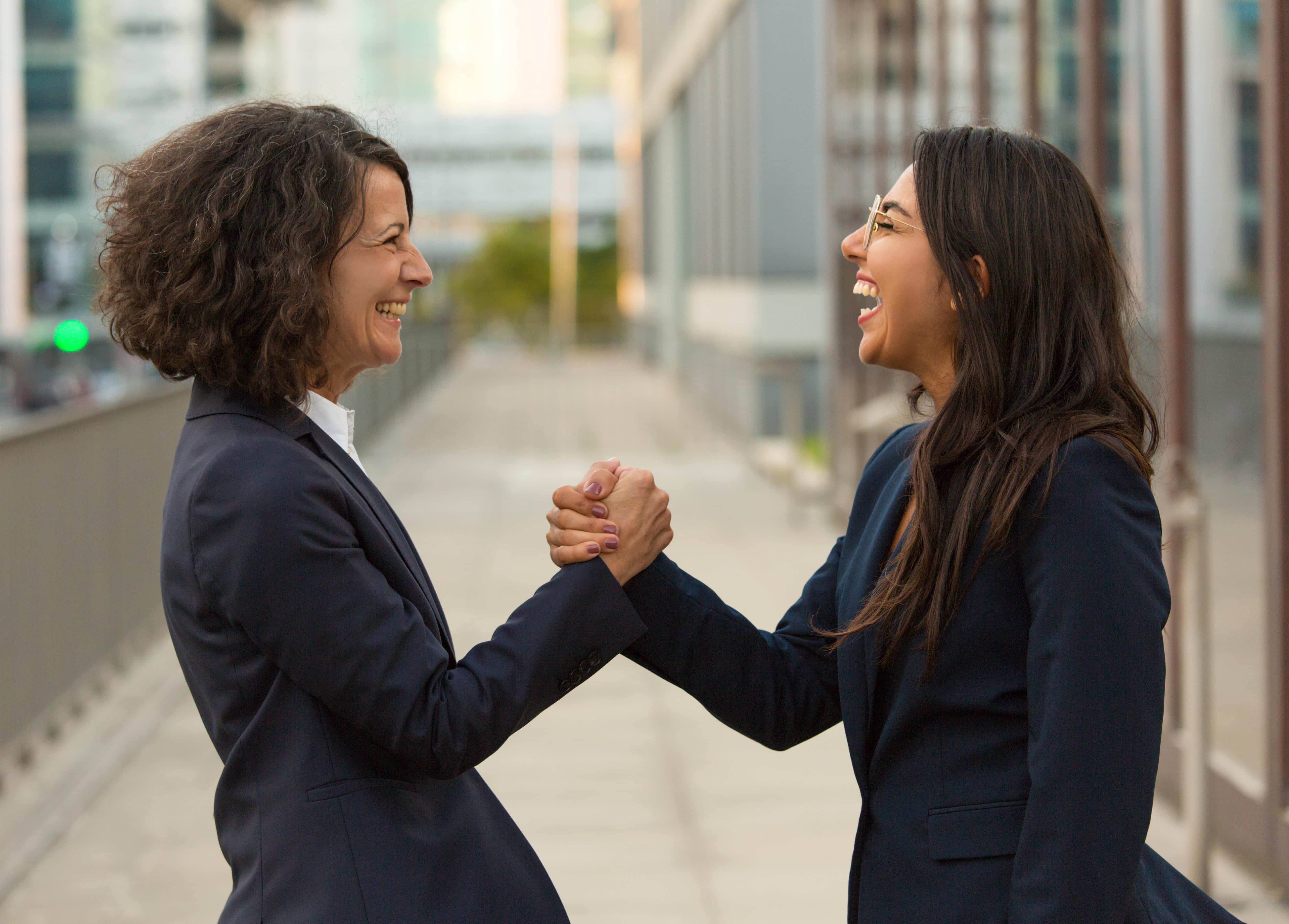 Happy excited colleagues celebrating triumph together
people, business, businesswoman, professional, leader, colleague, partner, friend, concept, portrait, woman, female, Caucasian, adult, young, Latin, middle aged, formal, suit, outside, office, building, city, street, urban, standing, giving, handshake, partnership, gesture, congratulation, cooperation, celebrating, success, joy, triumph, team, teamwork, successful, confident, happy, smiling, excited, overjoyed, laughing, friendly, side, view, two
Happy excited colleagues celebrating triumph together. Business women giving friendly handshake outside. Teamwork and success concept