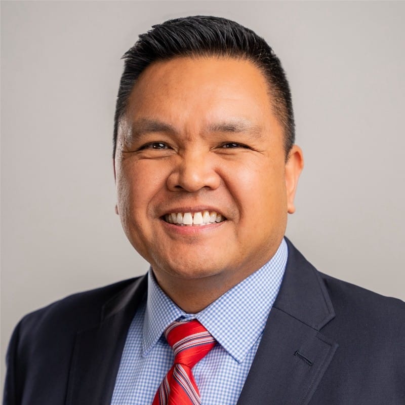 headshot of paul matubang, sales trainer and performance manager at amc living