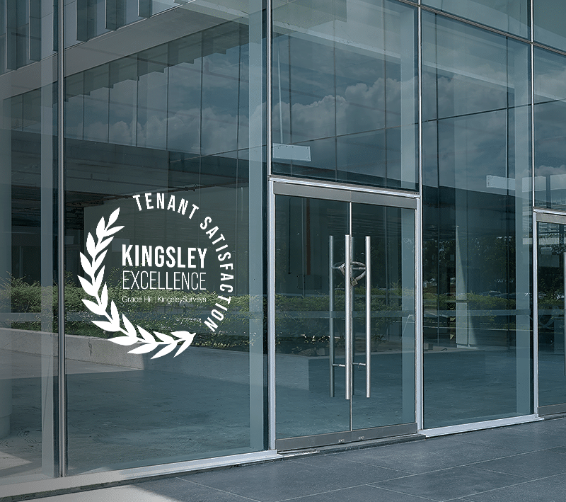 commercial real estate building with kingsley excellence award decal on the window for tenant satisfaction